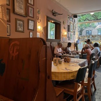 Cowgirl - a group of people sitting at a table in a restaurant - Southern Near Me - New York, New York Cowgirl - a group of people sitting at a table in a restaurant - Southern Near Me - New York, New York