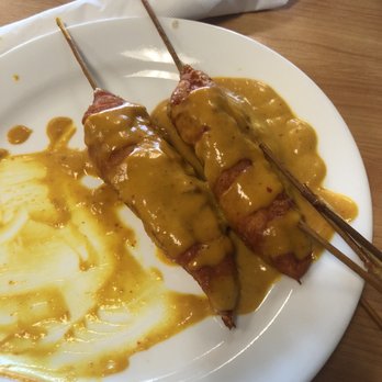 Thai Flavor - Chicken satay w/ peanut curry sauce is so amazing! - Thai Near Me - Battle Creek, Michigan Thai Flavor - Chicken satay w/ peanut curry sauce is so amazing! - Thai Near Me - Battle Creek, Michigan