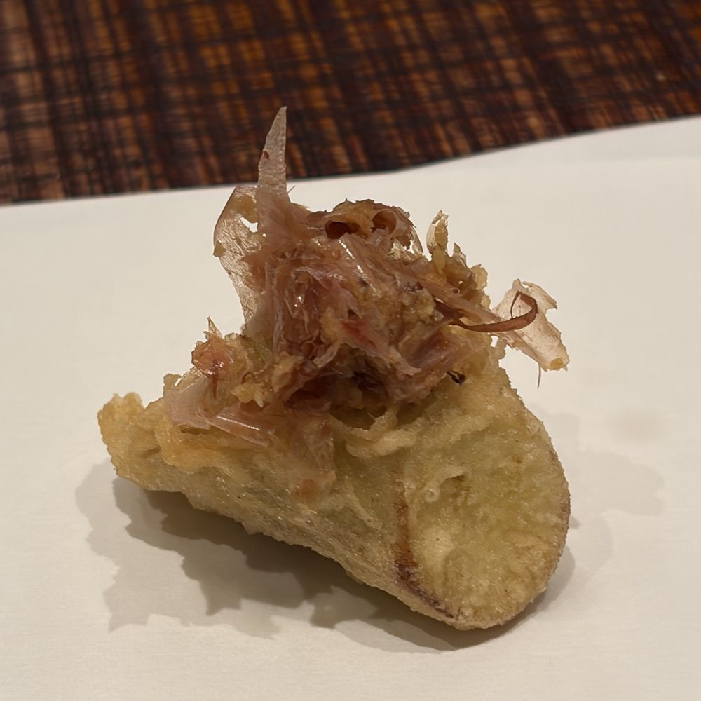 Tempura Ichika - Nasu tempura w myoga and katsuobushi. Note the dark edges of the end - an indicator of uneven frying and degraded oil quality. - Japanese Near Me - Honolulu, Hawaii