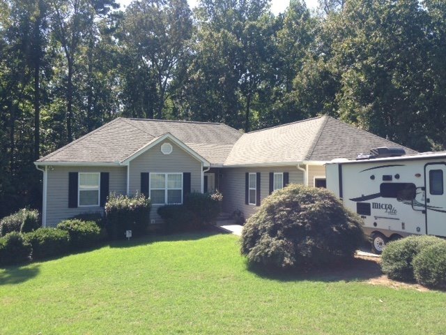 Slide of Todd Nelon Roofing