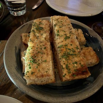 Seven Hills - Garlic & Parmesan Focaccia - Italian Near Me - San Francisco, California Seven Hills - Garlic & Parmesan Focaccia - Italian Near Me - San Francisco, California