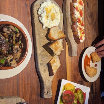 Barcelona Wine Bar - Homemade ricotta w/honey.. whipped sheeps milk on toast with figs... Mushrooms... beef empanadas and heirloom tomatoes - Tapas/Small Plates Near Me - Brookline, Massachusetts
