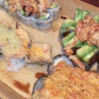 Sushi Katana - Left top is the Big H Roll bottom is Angel Roll. Right top is Mardi Gras Roll bottom Earthquake Roll. - Sushi Bars Near Me - Orlando, Florida Sushi Katana - Left top is the Big H Roll bottom is Angel Roll. Right top is Mardi Gras Roll bottom Earthquake Roll. - Sushi Bars Near Me - Orlando, Florida