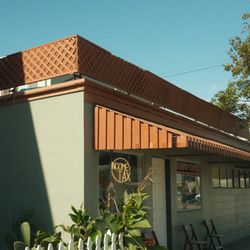 Pacific Travel - Left Side - Front of Business