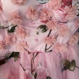 The employee was in the middle of glueing my petals back on with superglue or some adhesive that would not stick!! The employee was in the middle of glueing my petals back on with superglue or some adhesive that would not stick!!