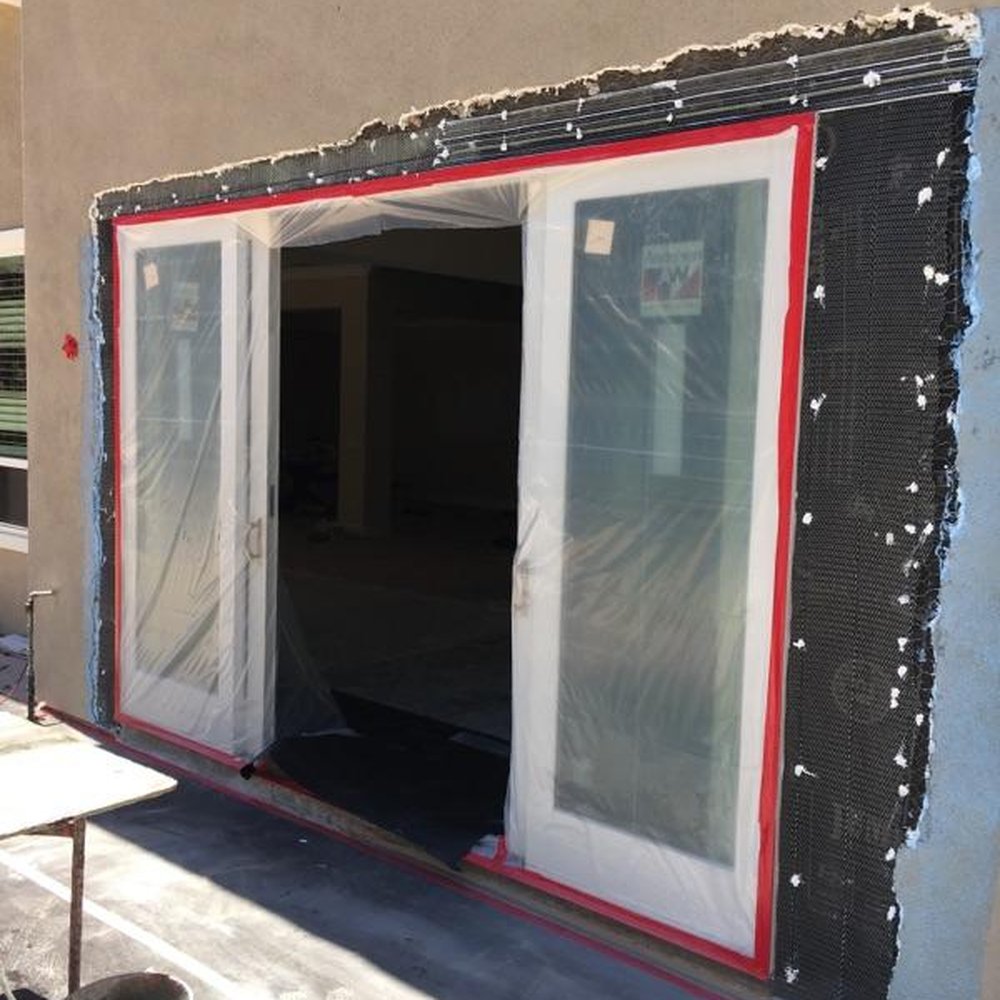 Patchwork's Plastering & Patching Specialists - Window prepped for stucco - Stucco Services Near Me Patchwork's Plastering & Patching Specialists - Window prepped for stucco - Stucco Services Near Me