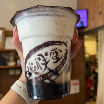 Half & Half Tea Express - a hand holding a cup of coffee - Juice Bars & Smoothies Near Me - Monterey Park, California Half & Half Tea Express - a hand holding a cup of coffee - Juice Bars & Smoothies Near Me - Monterey Park, California