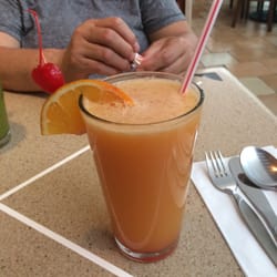 You must to try the Conga! It's an orange, grapefruit, pineapple mix.