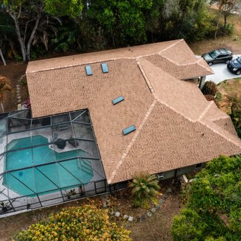 All-Type Roofing Services - Tamko Titan Xt Rustic Cedar Shingle with Impact glass Skylights - Roofing Near Me - Stuart, Florida All-Type Roofing Services - Tamko Titan Xt Rustic Cedar Shingle with Impact glass Skylights - Roofing Near Me - Stuart, Florida