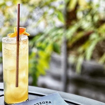 Metzger Bar and Butchery - Mocktail on the patio - German Near Me - Richmond, Virginia Metzger Bar and Butchery - Mocktail on the patio - German Near Me - Richmond, Virginia