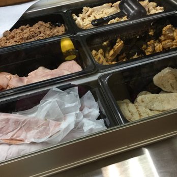 Subway - a variety of food items in trays - Sandwiches Near Me - Prattville, Alabama