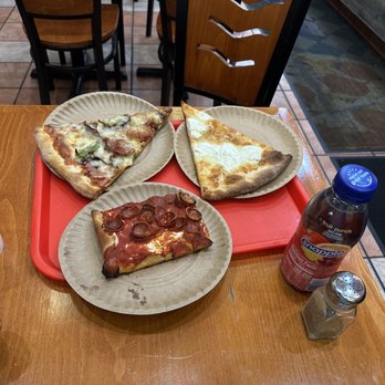 Famiglia Pizzeria - grandma slice with pepperoni cups, supreme style slice and a white slice. Can't forget the "Bev" never, never! - Pizza Near Me - White Plains, New York Famiglia Pizzeria - grandma slice with pepperoni cups, supreme style slice and a white slice. Can't forget the "Bev" never, never! - Pizza Near Me - White Plains, New York