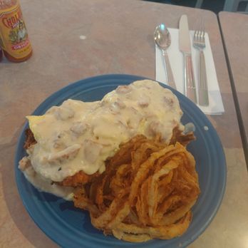Crest Cafe - Massive Burger Benedict on top of Bisquict with a side of Onion Rings. - Cafes Near Me - San Diego, California Crest Cafe - Massive Burger Benedict on top of Bisquict with a side of Onion Rings. - Cafes Near Me - San Diego, California