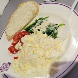 City Pub - Healthy breakfast with egg whites, feta cheese, spinach, tomatoes, and sourdough bread.