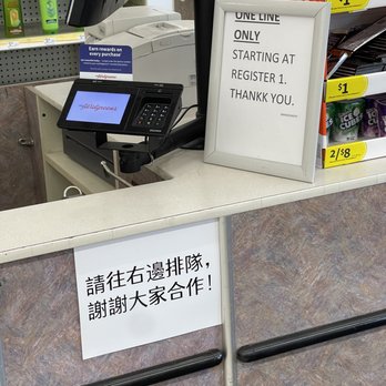 Walgreens - a sign on the counter at a store - Drugstores Near Me - Chicago, Illinois