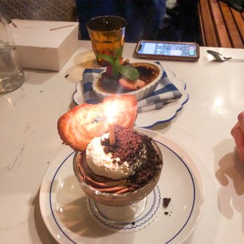 Poulet Bleu - Our chocolates mousse with a birthday candle - French Near Me - Pittsburgh, Pennsylvania