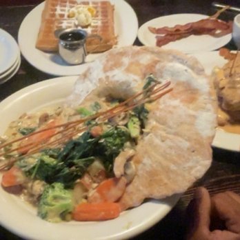 Hash House A Go Go - Chicken pot pie (front) Hash stack (right). Waffle and bacon. - New American Near Me - Las Vegas, Nevada Hash House A Go Go - Chicken pot pie (front) Hash stack (right). Waffle and bacon. - New American Near Me - Las Vegas, Nevada