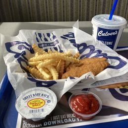 Two chicken tenders with crinkle cut fries