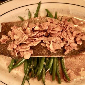 Pastis - Trout- fantastic and perfectly cooked green beans. The lighting there is so bad, sorry the food has this orange glow. - French Near Me - New York, New York Pastis - Trout- fantastic and perfectly cooked green beans. The lighting there is so bad, sorry the food has this orange glow. - French Near Me - New York, New York