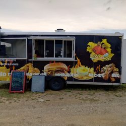 Boss's On Tha Move - This is a side view of the food truck itself.
