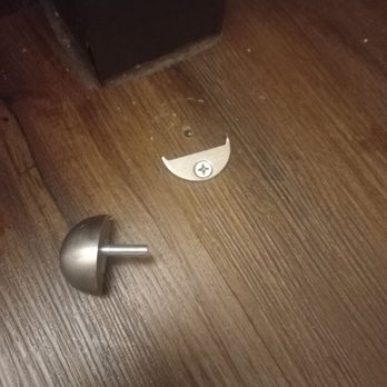 Super 8 by Wyndham Denver Stapleton - Broken door stopper so the door would slam into the wall and make a hole. Took photos so they wouldn't blame us. - Hotels Near Me - Denver, Colorado