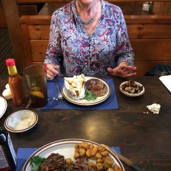 Section Hand Steakhouse - Mom has a filet mignon and a baked potato. - Steakhouses Near Me - Brownwood, Texas