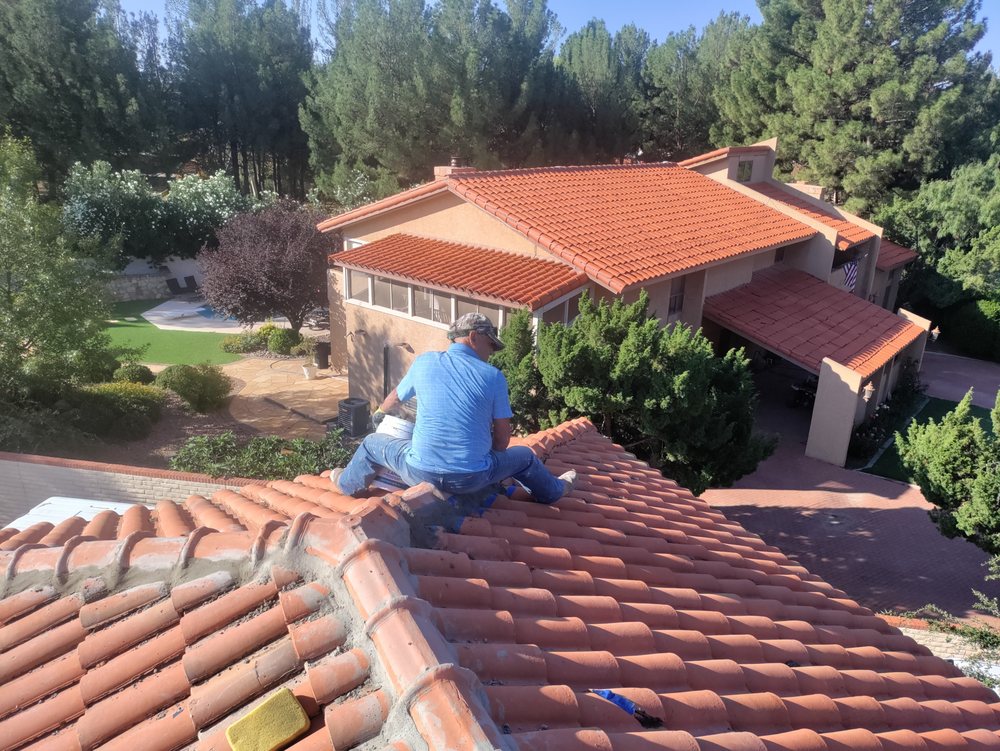 Slide of Baez Roof Service