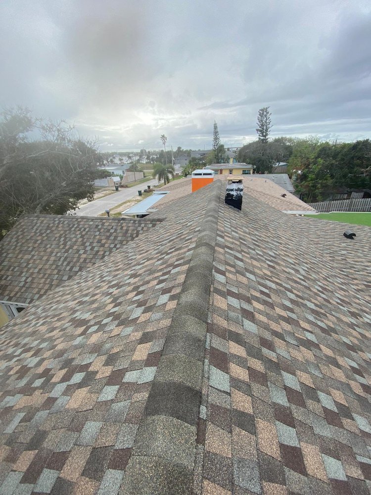 Slide of Amen Roofing Group