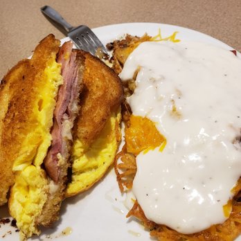 Denny's - Moons over Myhammy & hasbrowns have grilled onion, cheese, gravy, diced tomatoes and strips of bacon in the middle! So #yum #ReviewsByRL - American Near Me - Scottsburg, Indiana