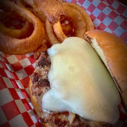 Mushroom and Swiss burger with onion rings Mushroom and Swiss burger with onion rings