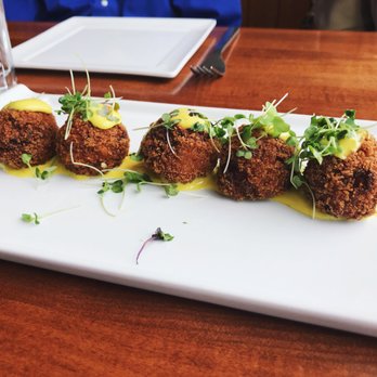 Rusty Pelican - Miami - Sea Bass and Salmon Buñuelos - Seafood Near Me - Key Biscayne, Florida Rusty Pelican - Miami - Sea Bass and Salmon Buñuelos - Seafood Near Me - Key Biscayne, Florida