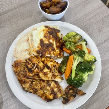 Rio Bonito Brazilian Grill - Grilled Chicken Breast with sides of plantains, chicken lasagna & vegetables - Brazilian Near Me - St Johns, Florida Rio Bonito Brazilian Grill - Grilled Chicken Breast with sides of plantains, chicken lasagna & vegetables - Brazilian Near Me - St Johns, Florida