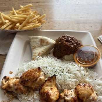 Luna Grill Oxnard - Chicken Kabob with Spicy Harissa Hummus - Mediterranean Near Me - Oxnard, California Luna Grill Oxnard - Chicken Kabob with Spicy Harissa Hummus - Mediterranean Near Me - Oxnard, California