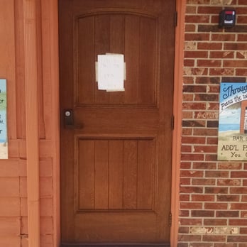 Sea Jax Tavern - The entrance, flanked by quirky signs. - Seafood Near Me - Kettering, Ohio Sea Jax Tavern - The entrance, flanked by quirky signs. - Seafood Near Me - Kettering, Ohio