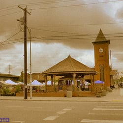 Sedro-Woolley Farmers Market - SEDRO'S SQUARE: temporary tents line up around the main town square near the gazebo, ready for a summer Wednesday.