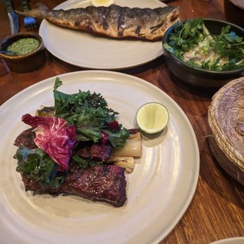 Damian - Carne Asada served with leeks. Pescado a la Brasa served with a side salad with chayote and onion. - Mexican Near Me - Los Angeles, California