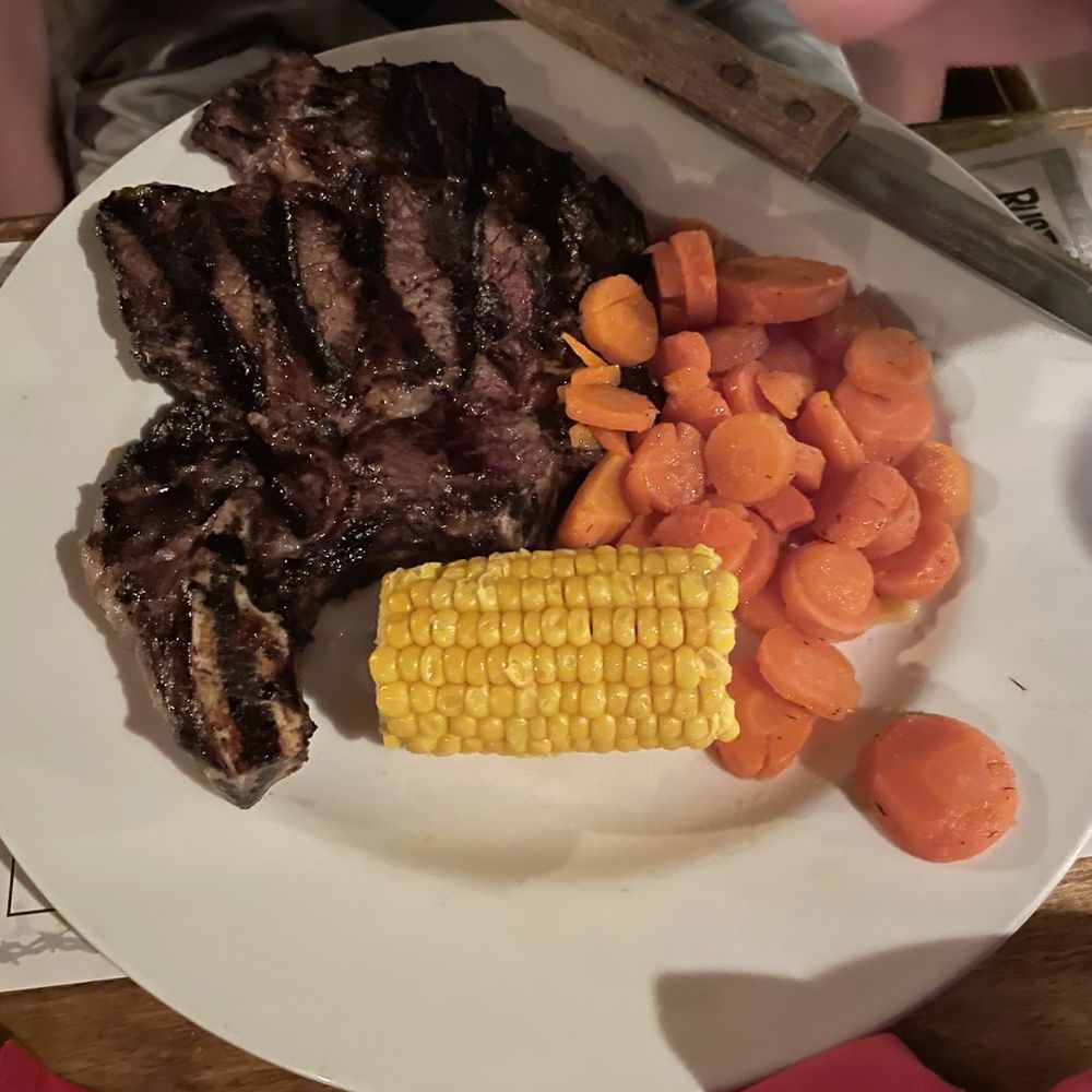 Rustler's Rooste - Ribeye steak, corn and carrots. - Steakhouses Near Me - Phoenix, Arizona Rustler's Rooste - Ribeye steak, corn and carrots. - Steakhouses Near Me - Phoenix, Arizona
