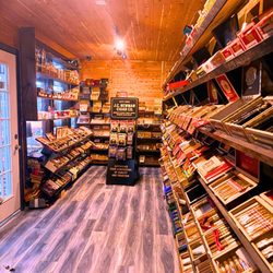 Tobacco Hut Vape - Fine Cigars - Hookah - Cigar room
