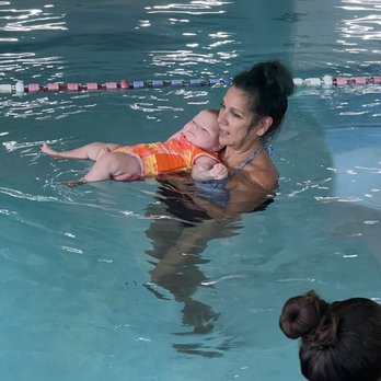 Aqua-Tots Swim School Spring/Klein - Baby learning to float. - Swimming Lessons/Schools Near Me - Spring, Texas Aqua-Tots Swim School Spring/Klein - Baby learning to float. - Swimming Lessons/Schools Near Me - Spring, Texas