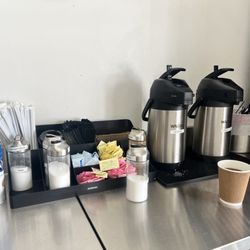 Coffee bar. Add creamer and sweetener to your liking.