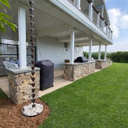 Gardens By Barbara Conolly - A carport turned into an outdoor kitchen and entertainment area