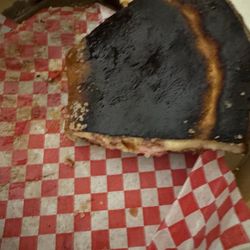 Citrola's Italian Grill & Pizzeria - Bottom of Stromboli, burnt to a char.