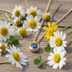 Miller's Jewelry - ~ Spring Blooms ~ Featured Jewelry: A Bezel-set Montana Yogo Sapphire Necklace in Yellow Gold