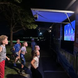 The Game Machine - Kids having fun playing Just Dance outside The Game Machine.