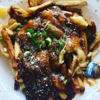 Big Ditch Brewing - Poutine!!! THIS gravy with its little bits of mushrooms and onions dancing on the fries with the perfect melty cheese curds. - New American Near Me - Buffalo, New York Big Ditch Brewing - Poutine!!! THIS gravy with its little bits of mushrooms and onions dancing on the fries with the perfect melty cheese curds. - New American Near Me - Buffalo, New York
