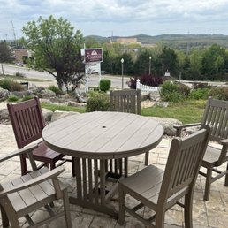 Patio seating overlooking the woods