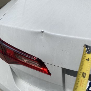 Bumper Fix - Here's another angle of the dent. Time to bring out the measuring tape! - Mobile Dent Repair Near Me