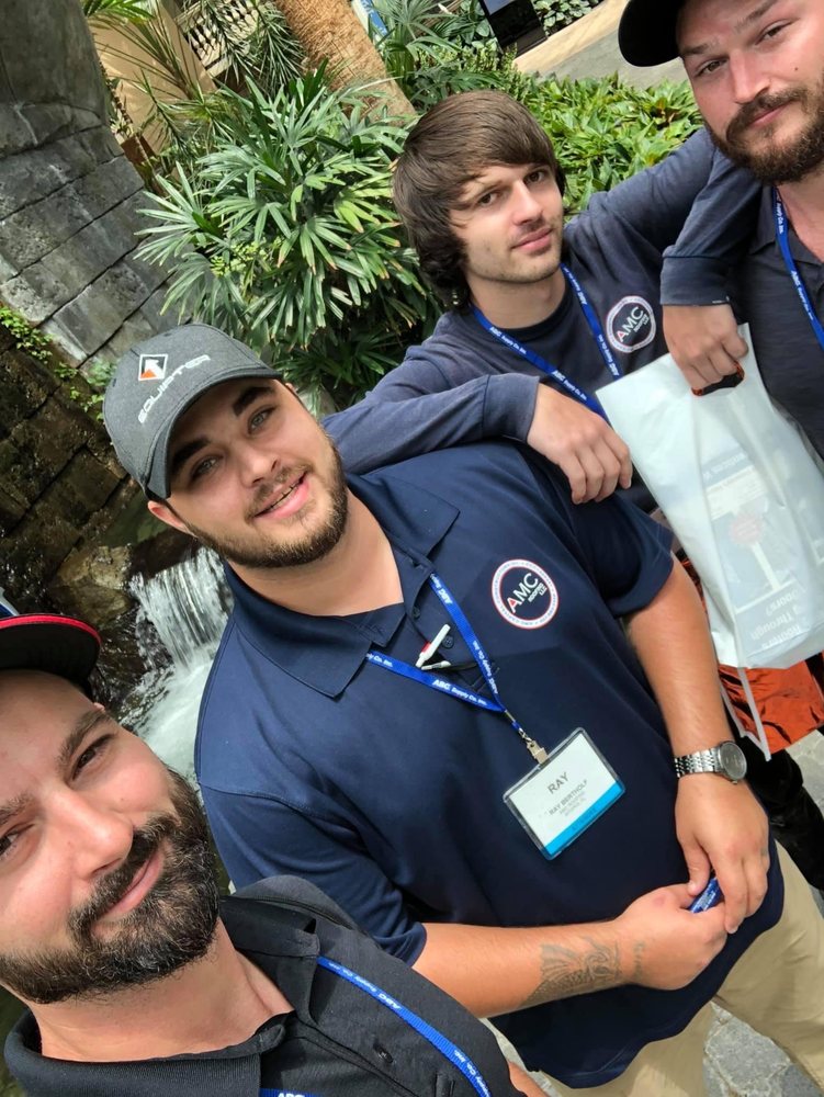 Slide of AMC Roofing