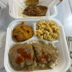 Memas Kitchen - Smothered and fried Pork Chops on white rice, with sweet potato and mac n cheese
