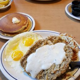 Chicken fried steak with eggs sunny side up, and of course PANCAKES! Chicken fried steak with eggs sunny side up, and of course PANCAKES!